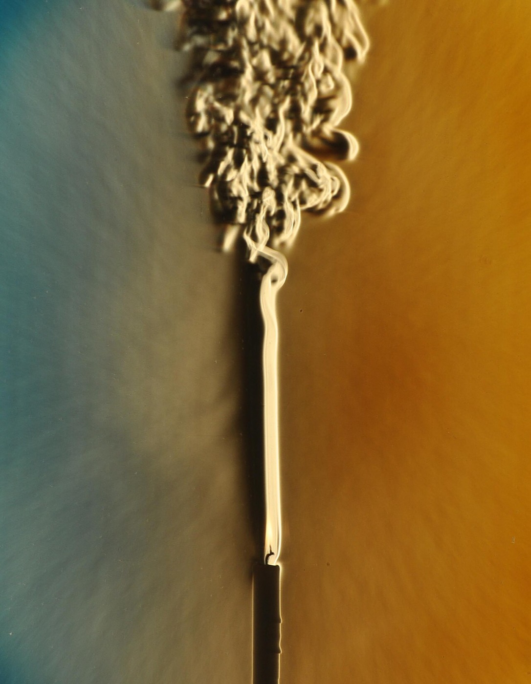 Candle smoke turning from orderly to turbulent flow